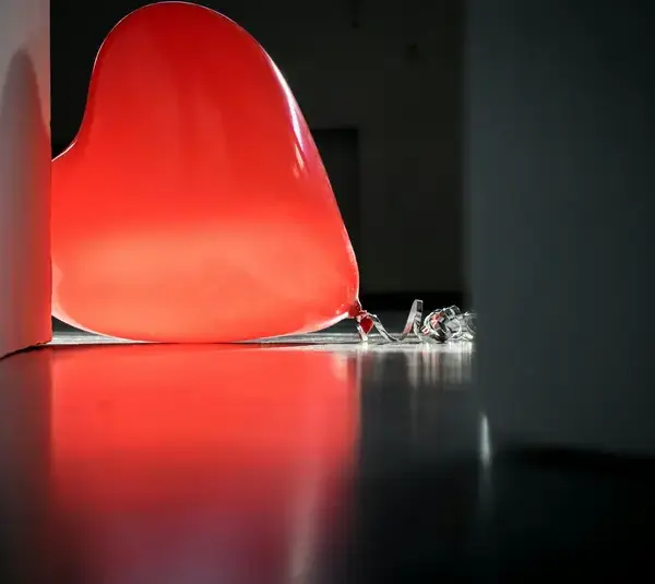 Valentine's Day, alone/Red Heart Balloon on Top of Floor