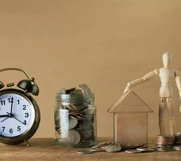 financial aid investment on a wooden table.