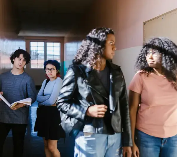 emotional health/Teenager with Disapproval Look in Corridor