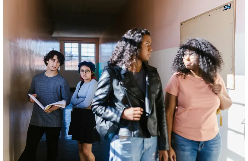 emotional health/Teenager with Disapproval Look in Corridor