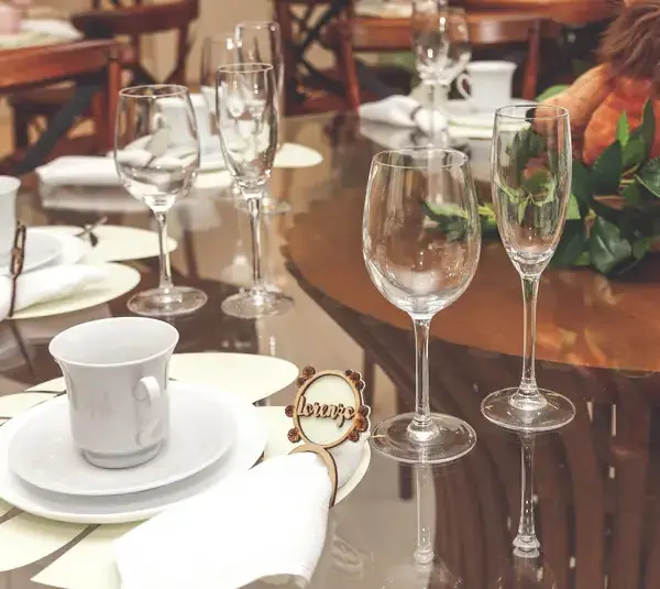 Table setting with crockery and flowers valentine dinner