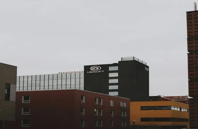 A building of Ubisoft near two other buildings, taken from a distance.