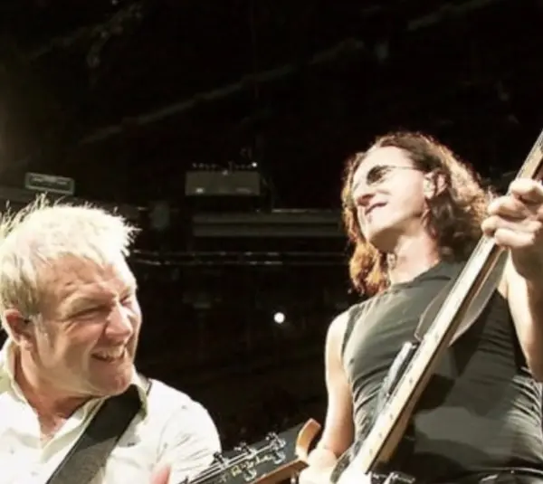Rush Alex Lifeson & Geddy Lee performing on tour