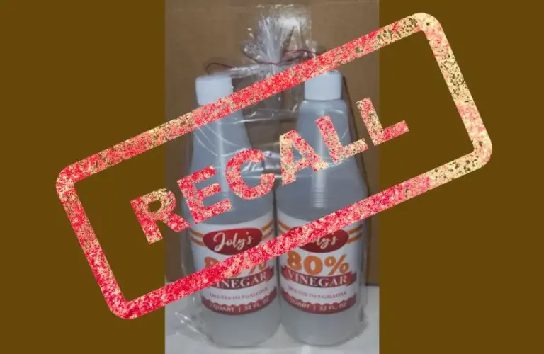 Two bottles labeled "80% Vinegar" with a bold red "Recall" stamp overlay. The tone is urgent, highlighting a safety concern.