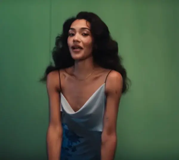 Olivia Dean, pictured singing "Man I Need," will be a headliner at BRITs Week 2026.