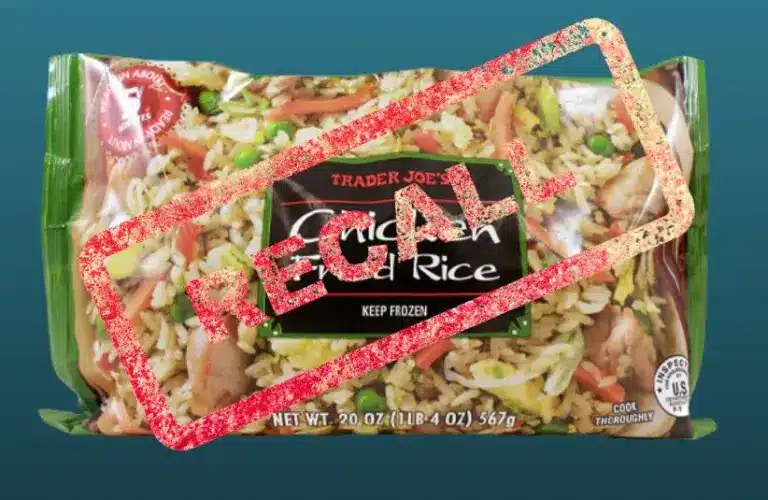 Packaged Trader Joe's Chicken Fried Rice against a blue background. A large red "RECALL" stamp overlays the image, indicating a recall notice.