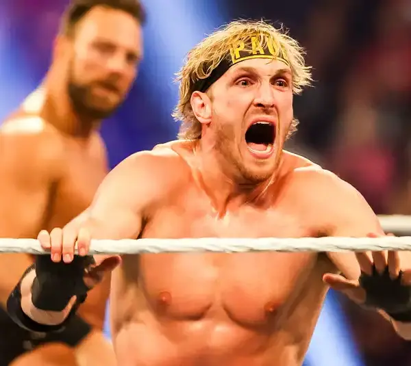 Logan Paul yells in celebration Saturday, Feb. 1, 2025, during the WWE Royal Rumble at Lucas Oil Stadium in Indianapolis. © Grace Smith/IndyStar / USA TODAY NETWORK via Imagn Images