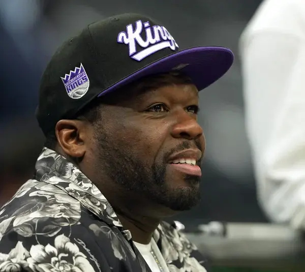 Apr 11, 2025; Sacramento, California, USA; Musical artist 50 Cent sits courtside before the game between the Sacramento Kings and the Los Angeles Clippers at Golden 1 Center. Mandatory Credit: Darren Yamashita-Imagn Images