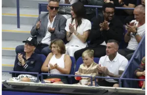 Sep 7, 2025; Flushing, NY, USA; P!nk sits with her family Willow Hart, Jameson Hart and Carey Hart during the final of mens singles at Billie Jean King National Tennis Center. Mandatory Credit: Mike Frey-Imagn Images