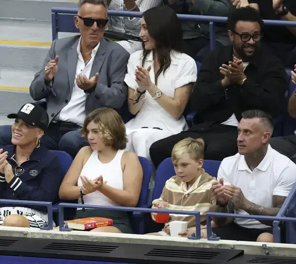 Sep 7, 2025; Flushing, NY, USA; P!nk sits with her family Willow Hart, Jameson Hart and Carey Hart during the final of mens singles at Billie Jean King National Tennis Center. Mandatory Credit: Mike Frey-Imagn Images