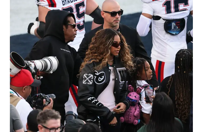 [US, Mexico & Canada customers only] Feb 8, 2026; Santa Clara, CA, USA; Recording artist Jay-Z with his daughters Blue Ivy and Rumi Carter before Super Bowl LX between the New England Patriots and the Seattle Seahawks at Levi's Stadium. Mandatory Credit: Carlos Barria/Reuters via Imagn Images