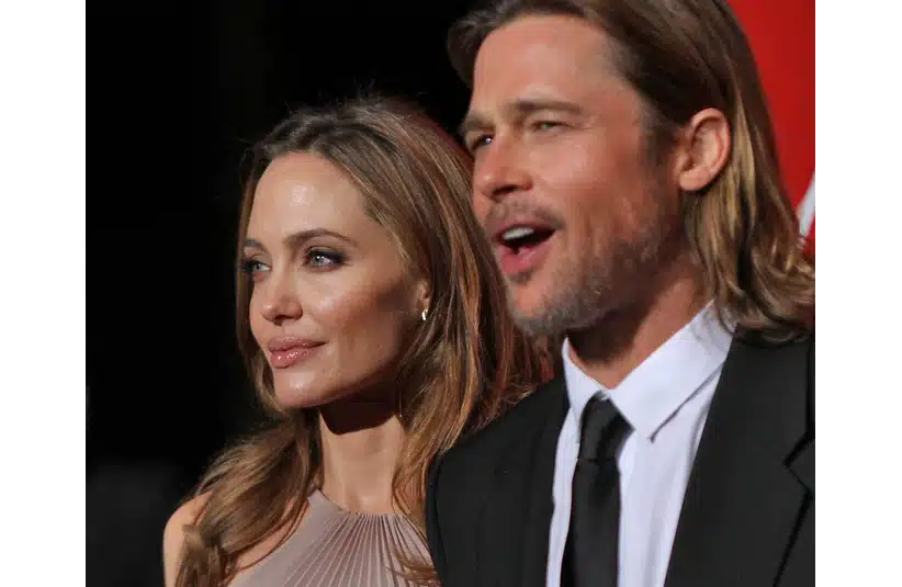 Jan 7, 2012; Palm Springs, CA, USA; Brad Pitt and Angelina Jolie (left) arrive on the red carpet at the 2012 Palm Springs International Film Festival. Mandatory Credit: Jay Calderon/The Desert Sun via USA TODAY NETWORK