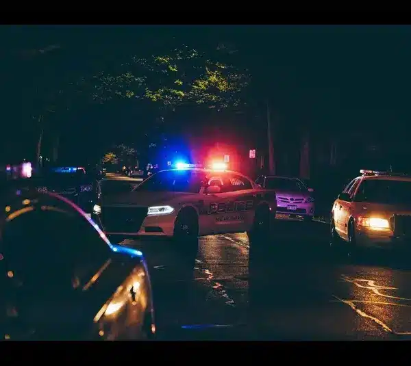 Caleb Flynn, arrested for allegedly shooting and killing his wife, Ashley Flynn - Photo of Police Cars