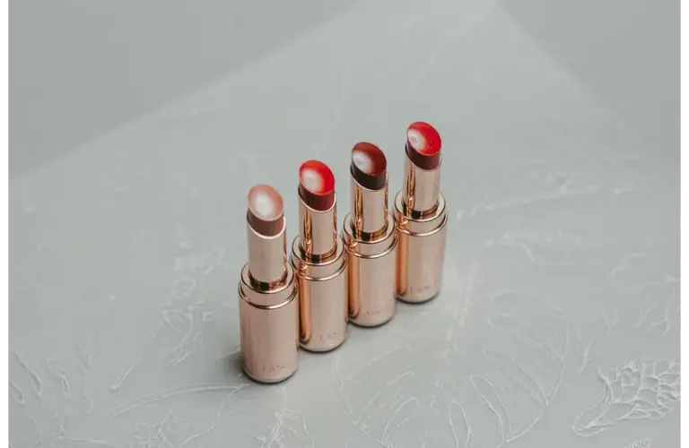 Different lip shades with a golden metal packing