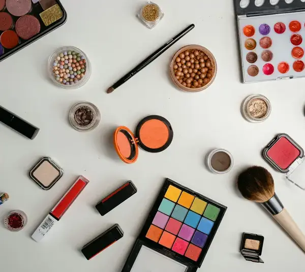 Aesthetic makeup products on a white table