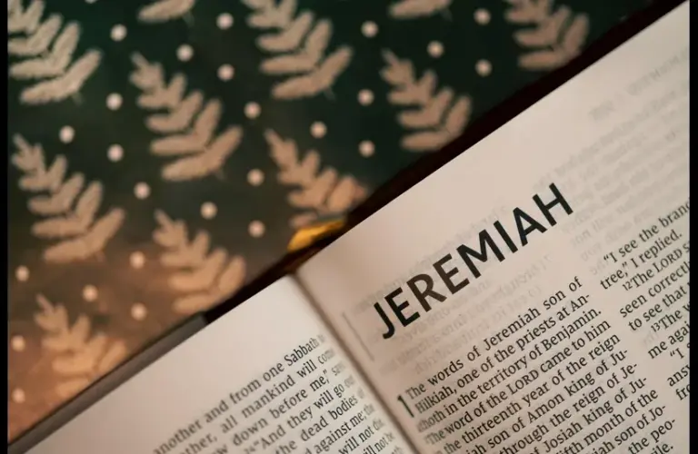 In daily devotion, a Bible is open to Jeremiah.