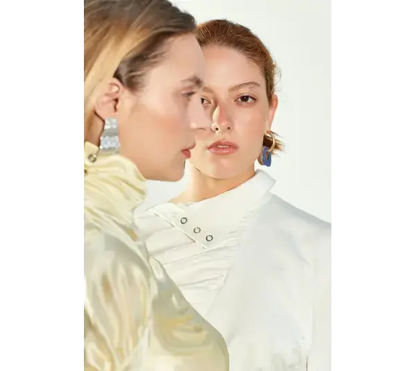 winter to spring fashion transition shows two women as a segment of fashion