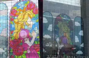two image beside each other of Princess Peach stained glass mural from Mario 64 game. The Left image of the interior of mural and the right is the outside view.