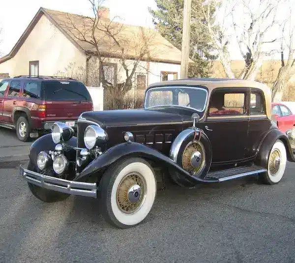 Image of 1931 Reo Royale Victoria Eight parked on the street in front of a house, REO Royale Eight