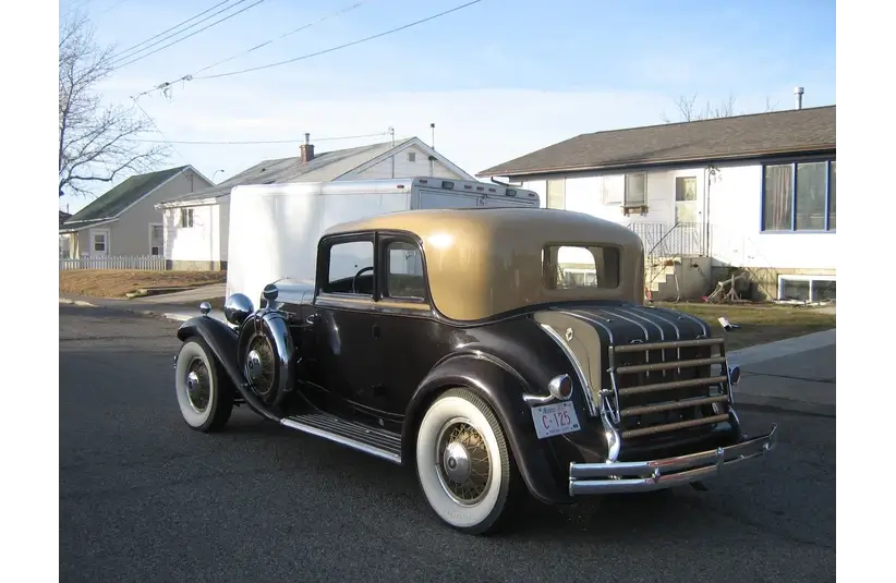 Image of 1931 Reo Royale Victoria Eight parked on the street in front of a house