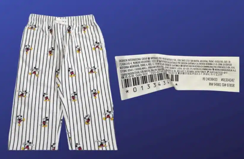 Images of Forever 21 Kids Disney Mickey Mouse Pajama Pants and tag on a dark blue background