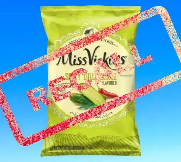 Image of Miss Vickie’s Spicy Dill Pickle Potato Chips bag on a light blue background with Recall stamped over it