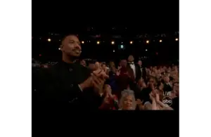 Image of the Sinners cast in the audience at the Oscars, Sinners received Oscar for Best Original Screenplay