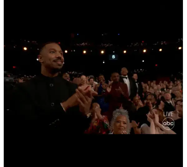 Image of the Sinners cast in the audience at the Oscars, Sinners received Oscar for Best Original Screenplay