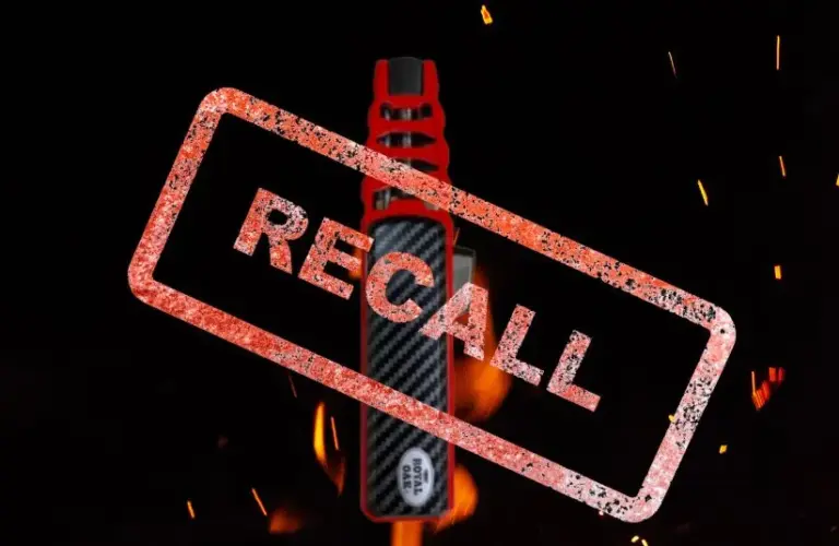 Image of Royal Oak Flame Saber Lighter on a black background with flames and the word Recall stamped over it