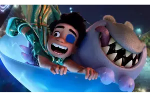 Characters from Disney Pixar "Elio" a boy and ginning shark alien falling through the sky