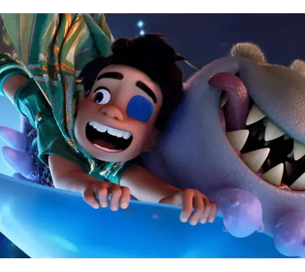 Characters from Disney Pixar "Elio" a boy and ginning shark alien falling through the sky