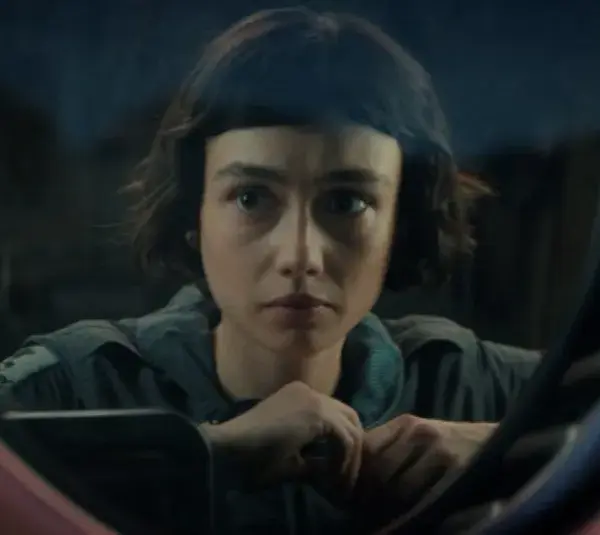 Sydney Chandler as Wendy looks out a window in "Alien Earth"