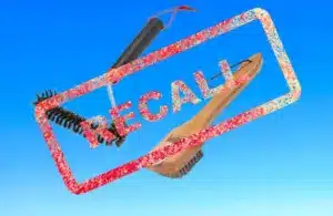 Images of Weber grill brushes in two styles on a light blue background with Recall stamped over them