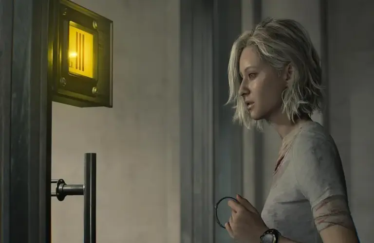 Grace looking at the Level 3 ID control panel in Emily room in Resident Evil Requiem