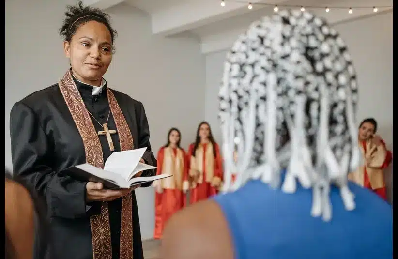 In daily devotion, a minister is speaking to someone.