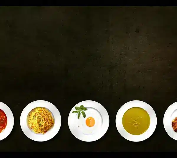 variety of different comfort foods in 5 plates