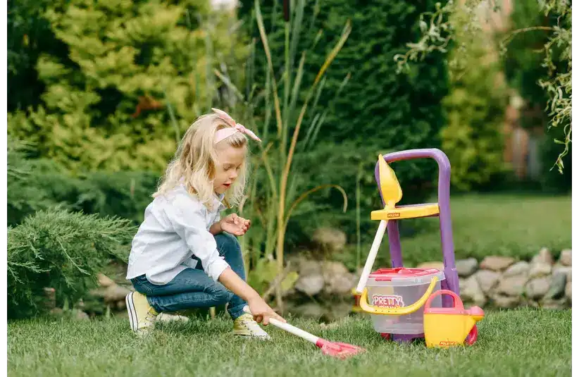 A girl playing with outdoor toys