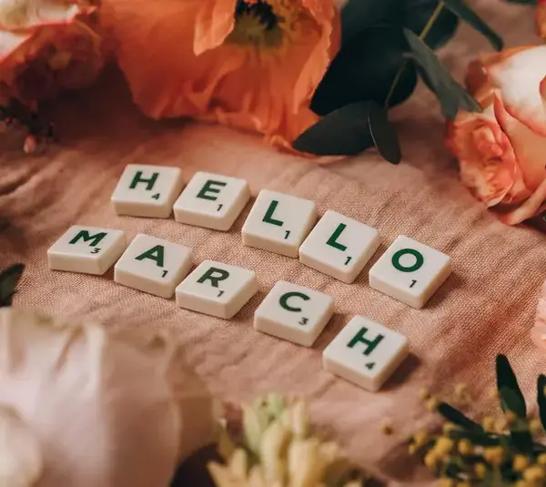 Tiles spelling out "Hello March" in preparation for the book of the month