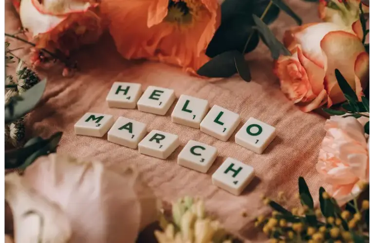 Tiles spelling out "Hello March" in preparation for the book of the month