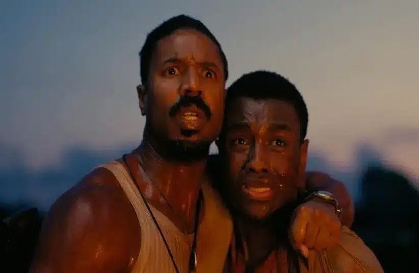 Screenshot of 2026 Oscars nominees Michael B. Jordan and Miles Caton in the movie "Sinners"