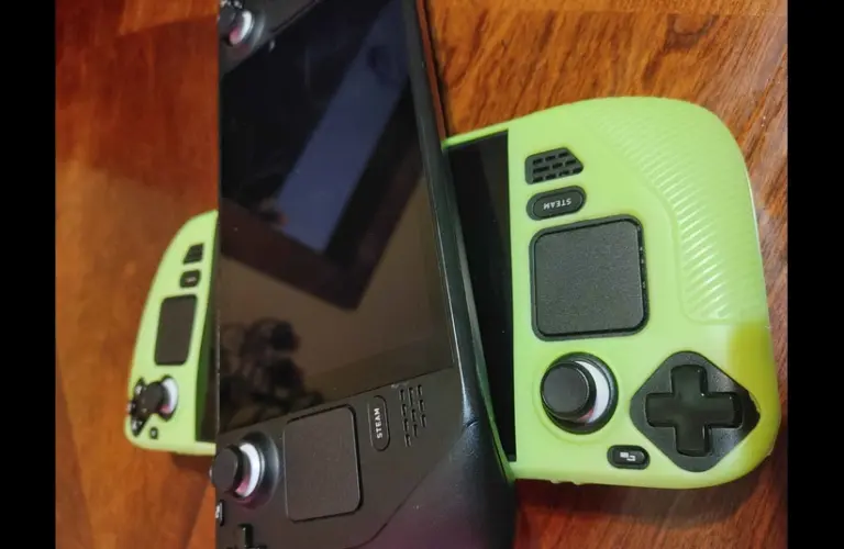 2 Steam Decks on a Wooden Table