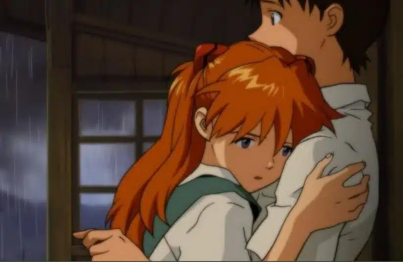 Asuka Langley Soryu and Shinji Ikari embrace during a rainstorm.