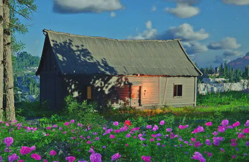a wooden cabin in a field of flowers in Crimson Desert