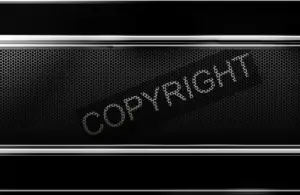 A metallic black background with a honeycomb pattern, featuring the word "COPYRIGHT" in bold, dotted letters tilted diagonally across the center.
