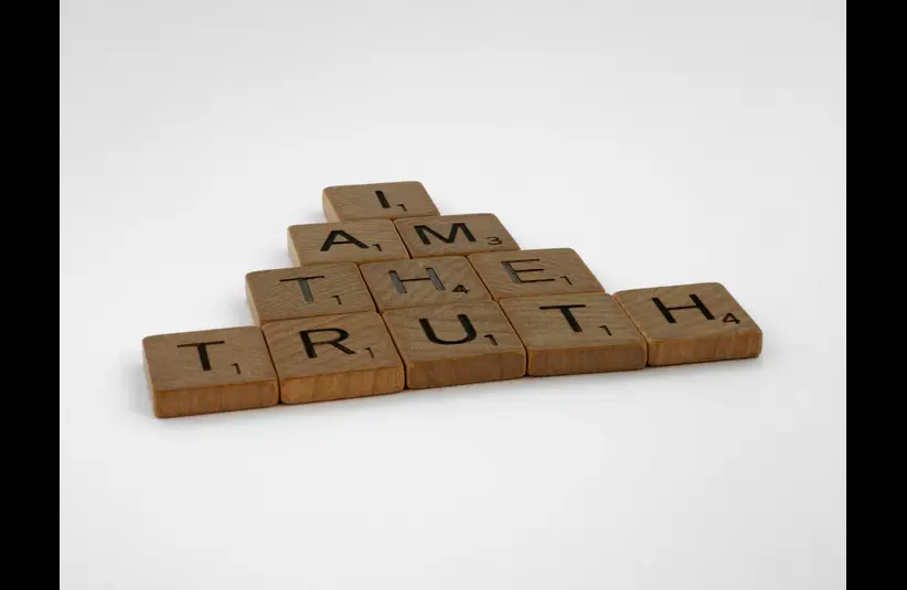 In this daily devotional, blocks spelling out "I am the truth" are seen. 