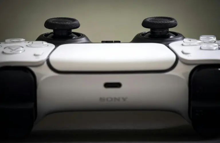 Close-up of a PlayStation 5 DualSense controller, the pad Suri: The Seventh Note PS5 players will use for its rhythm haptics