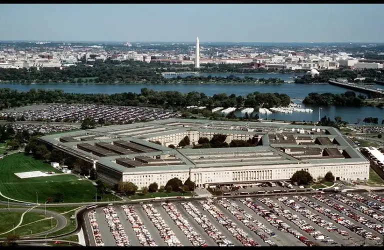 The Pentagon, looking northeast with the Potomac River and Washington Monument in the distance. The Tidal Basin is seen just below the Washington Monument. The marina which is visible is in Pentagon Lagoon, which is part of the Boundary Channel of the Potomac River. Trees border the Boundary Channel and exist both on the Virginia shoreline and on Columbia Island, Fort Hood shooter execution livestream