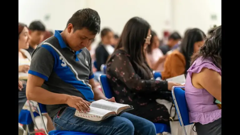 In daily devotional, people in a Bible school or class are studying the Bible.