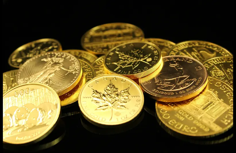 In this daily devotional, gold coins are shown against a black background.