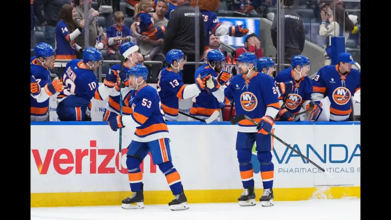 Apr 12, 2026; Elmont, New York, USA; New York Islanders center Casey Cizikas (53) and defenseman Scott Mayfield (24) celebrate a goal against the Montreal Canadiens in the third period at UBS Arena. Mandatory Credit: Alexander Wohl-Imagn Images